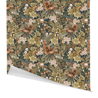 Hellebore Midnight gift wrap featuring dense floral pattern with copper flowers, white blooms, and olive foliage on dark teal background. Illustrated by Lisel Ashlock.