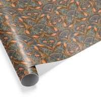 Roll of apricot and teal floral patterned gift wrap with ornate botanical design illustrated by Lisel Ashlock.