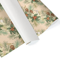Rolls of blush-colored gift wrap featuring holly berries, pine branches, pinecones, and hares among botanical elements. Illustrated by Lisel Ashlock.