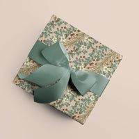 Wrapped gift box with botanical berry and floral patterned paper tied with sage green ribbon. Illustrated by Lisel Ashlock.
