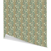 Rolled gift wrap featuring a repeating pattern of evergreen branches, white flowers, and red berries on sage green background. Illustrated by Lisel Ashlock.