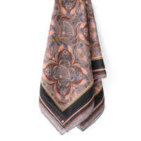 Silk cotton scarf with dusted lavender filigree floral pattern and black border trim. Illustrated by Lisel Ashlock.