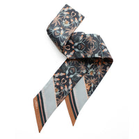 Moonstone Monkey silk twill twilly scarf with botanical print and striped ends. Illustrated by Lisel Ashlock.