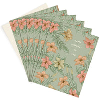 A fan of Happy Birthday greeting cards with pink and peach flowers on sage green background. Illustrated by Lisel Ashlock.