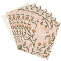 A fanned stack of Mother's Day greeting cards with orange wildflower illustrations on a pale pink background. Illustrated by Lisel Ashlock.