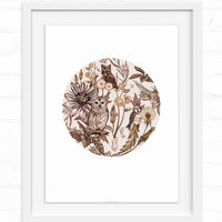 Circular illustration of owls and birds among flowers and foliage in brown sepia tones. Illustrated by Lisel Ashlock.