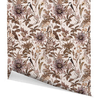 Sepia-toned gift wrap featuring owls, flowers, and botanical elements in a repeating pattern. Illustrated by Lisel Ashlock.