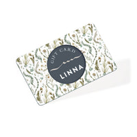 A LINNA digital gift card featuring botanical illustrations with a dark circular logo, illustrated by Lisel Ashlock.