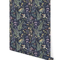 Secret Garden Wallpaper in Amethyst featuring botanical illustrations with birds and flowers on dark blue background, illustrated by Lisel Ashlock.