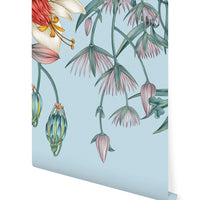 Canopy Mural wallpaper featuring botanical illustrations of hanging flowers and buds on a light blue background. Illustrated by Lisel Ashlock.