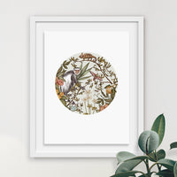 A circular illustration of a guereza monkey surrounded by botanical elements and wildlife, illustrated by Lisel Ashlock.