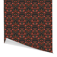 Ornate damask floral gift wrap in coral, gold, and black with a peeling corner. Illustrated by Lisel Ashlock.