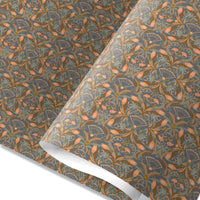 Apricot-colored floral and fan patterned gift wrap roll showing texture and fold. Illustrated by Lisel Ashlock.