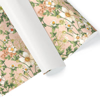 Rolled gift wrap featuring white anemones and coral flowers on pink background. Illustrated by Lisel Ashlock.