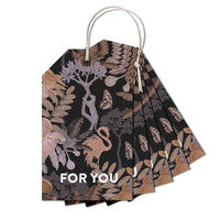 Fan-shaped gift tags with botanical and wildlife illustrations in earth tones, labeled "FOR YOU." Illustrated by Lisel Ashlock.