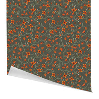 Rambling Blooms in Earth gift wrap featuring orange flowers on sage green background. Illustrated by Lisel Ashlock.