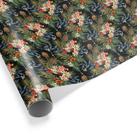A roll of dark green gift wrap featuring red dala horses, white flowers, blue leaves, pinecones, and orange berries. Illustrated by Lisel Ashlock.