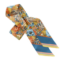 Marigold silk twilly scarf with floral print and striped ends in blue, orange, and yellow. Illustrated by Lisel Ashlock.