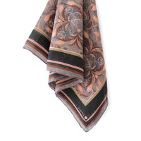 Silk cotton scarf in dusted lavender with filigree floral pattern and black border stripe. Illustrated by Lisel Ashlock.