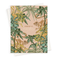Greeting card with illustrated monkeys among tropical flowers and foliage on pink background reading "Forever my monkey." Illustrated by Lisel Ashlock.