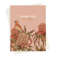 A thank you greeting card featuring a kestrel bird perched on pink protea flowers against a warm beige background. Illustrated by Lisel Ashlock.