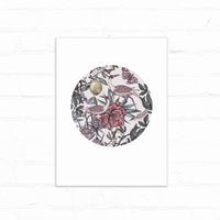 Circular illustration of exotic birds among flowering plants and foliage in muted tones on white paper. Illustrated by Lisel Ashlock.