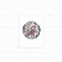Circular illustration of exotic birds among flowers and foliage in muted purple and green tones. Illustrated by Lisel Ashlock.