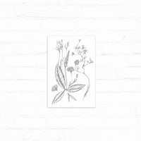 Detailed pencil sketch of wildflowers and botanical elements on white paper against a white wooden background. Illustrated by Lisel Ashlock.