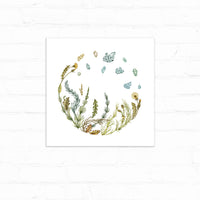 Watercolor illustration of herbs and wildflowers arranged in a circular wreath with teal crystals floating above. Illustrated by Lisel Ashlock.