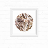 Circular botanical illustration featuring owls and birds among flowers and foliage in sepia tones, framed in white. Illustrated by Lisel Ashlock.