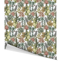 Seamless desert botanical pattern featuring cacti, succulents, and pink flowers on white gift wrap. Illustrated by Lisel Ashlock.