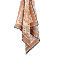 Sunstone silk cotton scarf with botanical fern and floral design in terracotta and cream, illustrated by Lisel Ashlock.