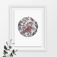 Circular illustration of exotic birds, flowers, and fruit in muted colors within a white frame. Illustrated by Lisel Ashlock.